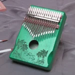 Kalimba 17 blades in green wood - Palm and nature motif