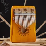 Kalimba 17 lames en bois d'érable - Bois clair - Motif soleil